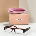 Miu Miu SMU B07-F Sunglasses